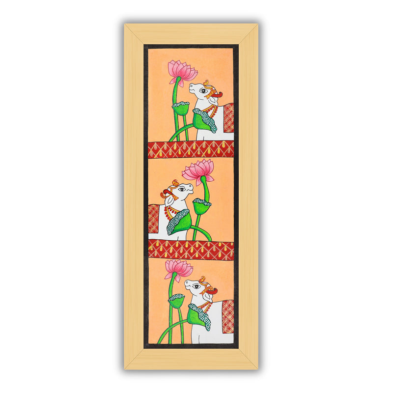 Framed artwork of a colorful cow-with handmade pichwai painting