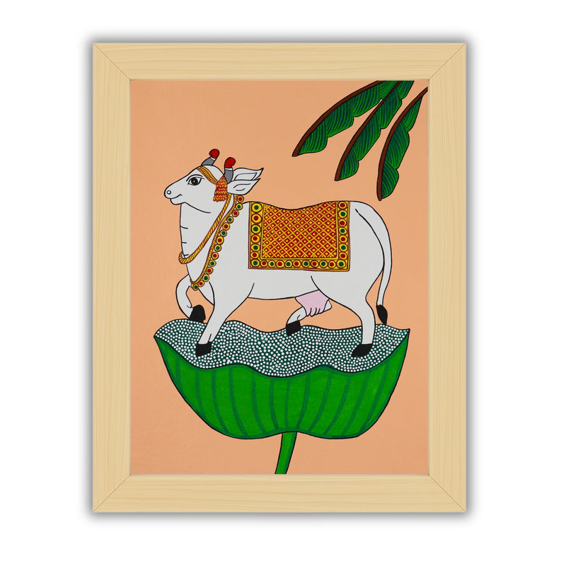 Framed artwork of a colorful cow illustration on a peach background-with handmade pichwai painting
