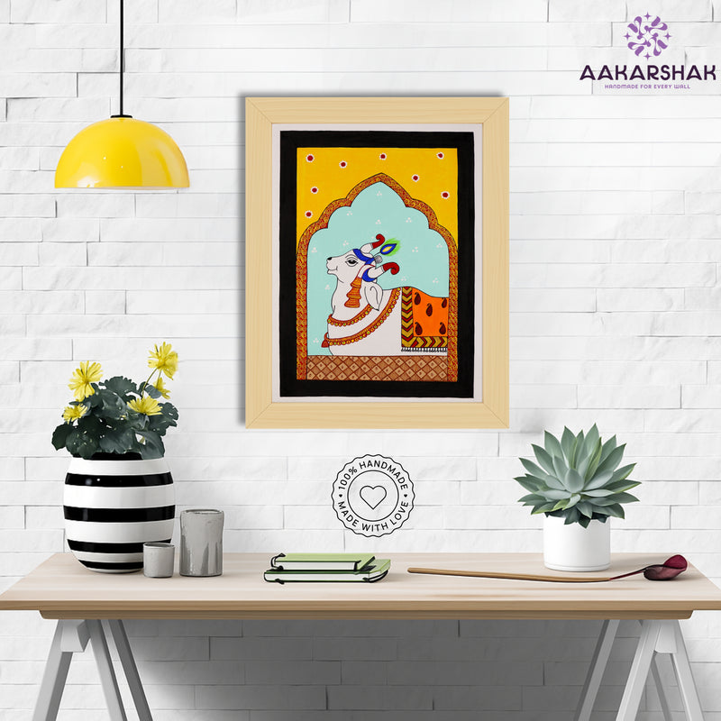Framed artwork with cow design on a yellow background-handmade pichwai painting for home decor