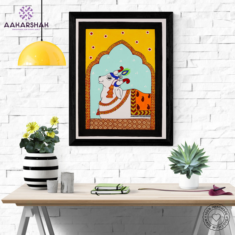 Framed artwork with peacock design on a yellow background-handmade pichwai painting for home decor
