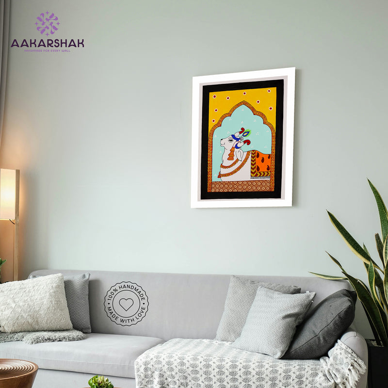 vibrant handmade cow painting-depicting indian folk traditions