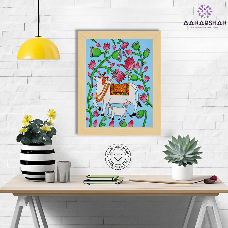 Framed artwork with cow design on a blue background-handmade pichwai painting for home decor