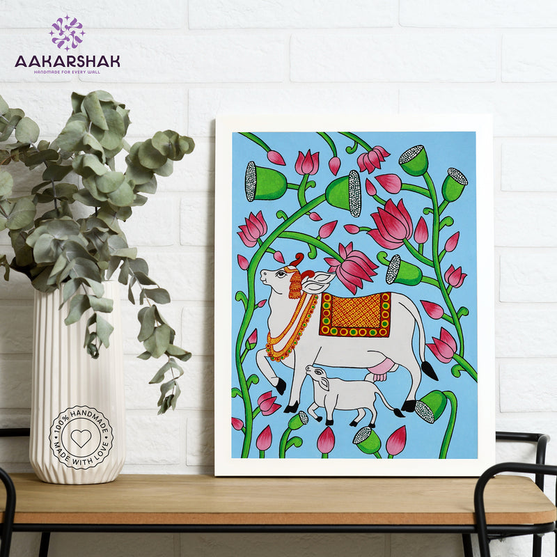 Framed artwork with cow design on a blue background-handmade pichwai painting for home decor