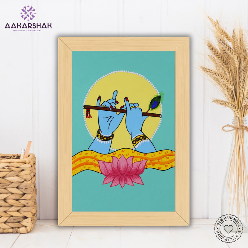 Framed artwork with krishna hands playing a flute on a teal background-with tabletop stand for home decor