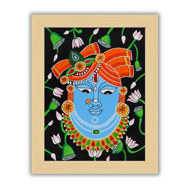 Framed artwork of a colorful krishna illustration on a black background-with handmade pichwai painting