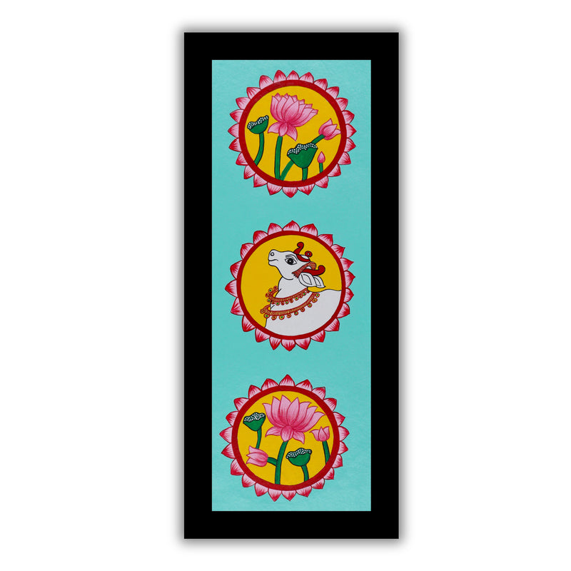 Framed artwork of a colorful lotus and cow-with handmade pichwai painting