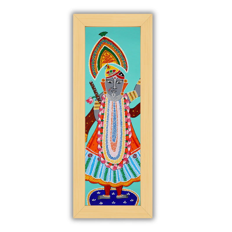 Framed artwork of a colorful shrinathji-with handmade pichwai painting