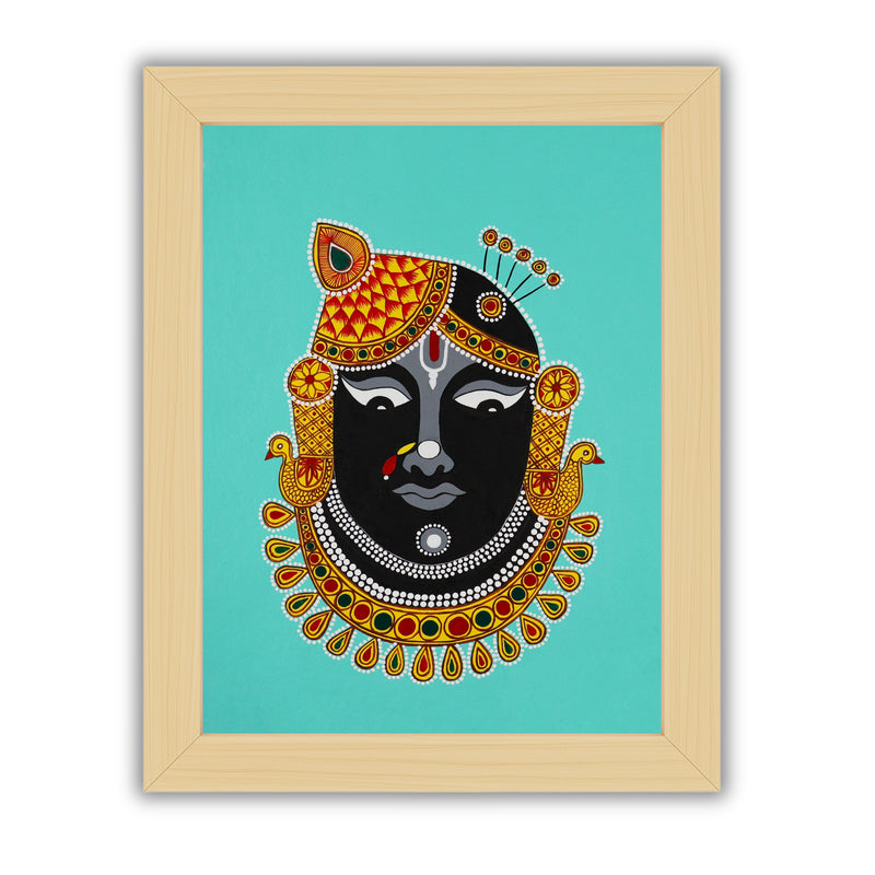Framed artwork of a colorful shrinathji illustration on a light green background-with handmade pichwai painting