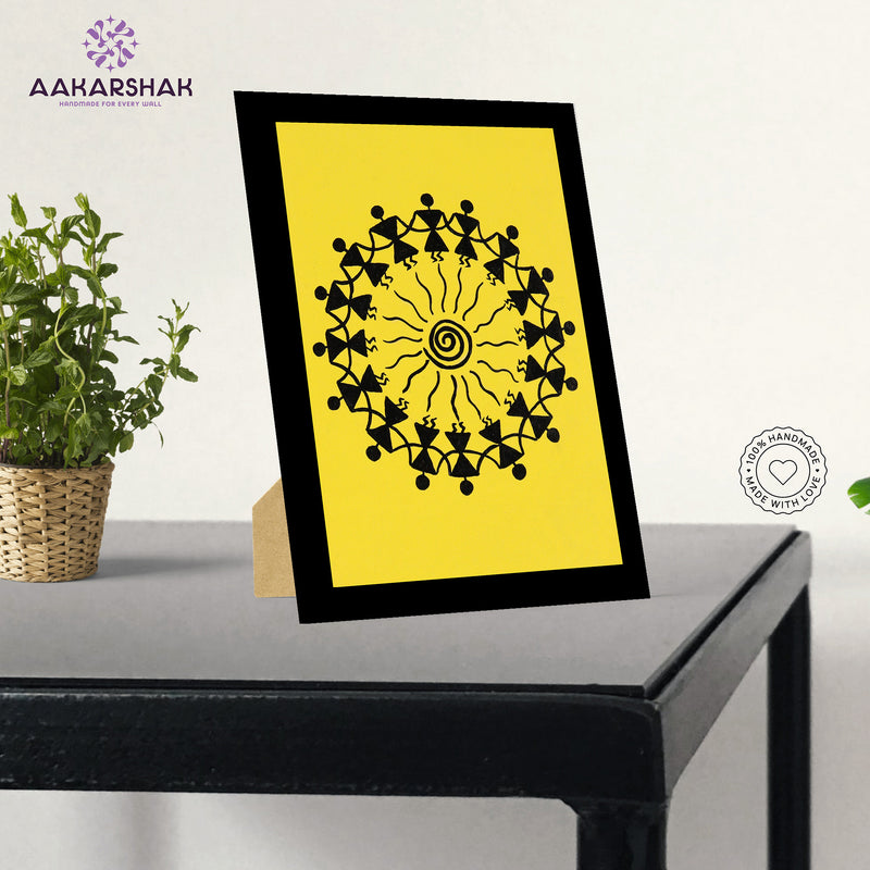 Framed artwork with a yellow background and black design-handmade dancing painting