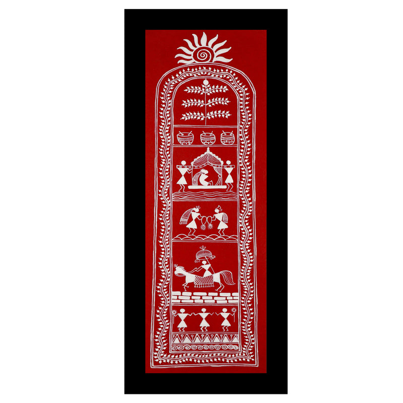 Framed artwork of a colorful dolly-with handmade warli painting