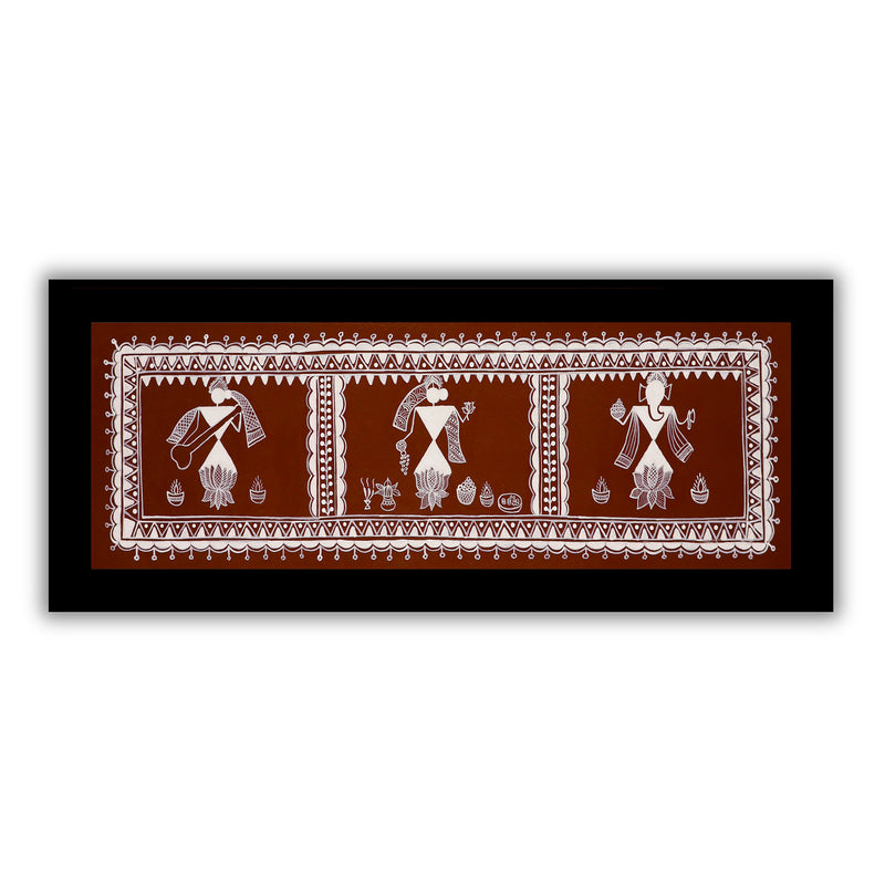 Framed artwork of a colorful ganesh-laxmi-saraswati-with handmade warli painting