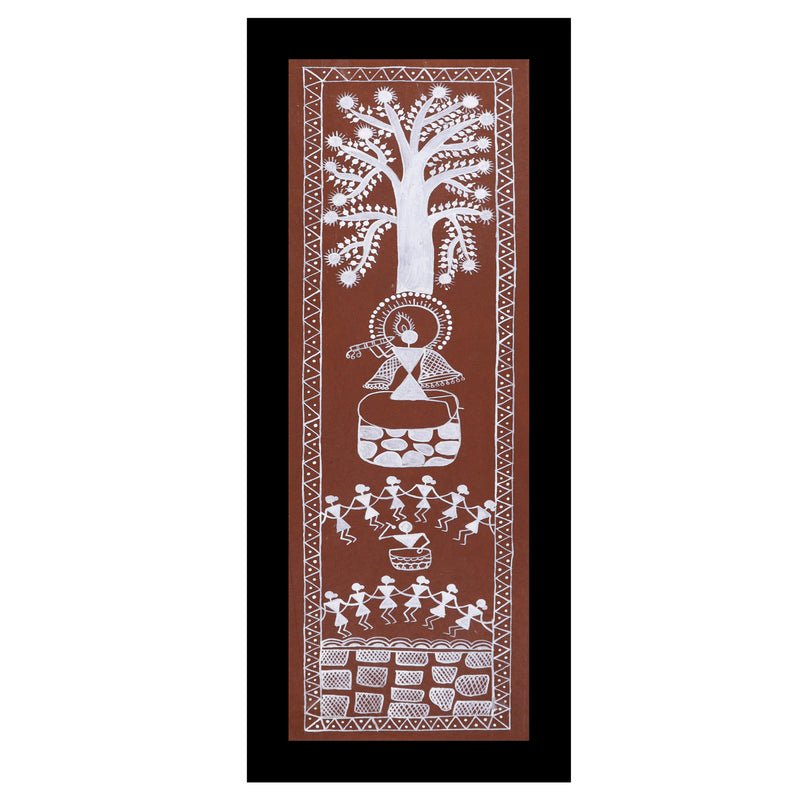 Framed artwork of a colorful krishna -with handmade warli painting