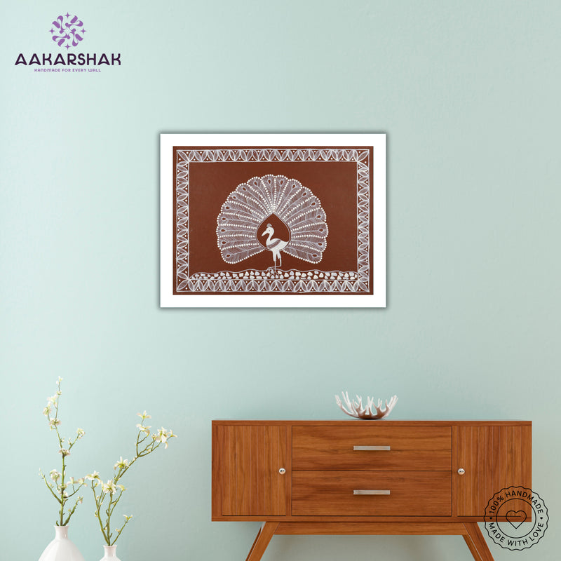 Framed artwork with white peacock design on a brown background-handmade warli painting for home decor