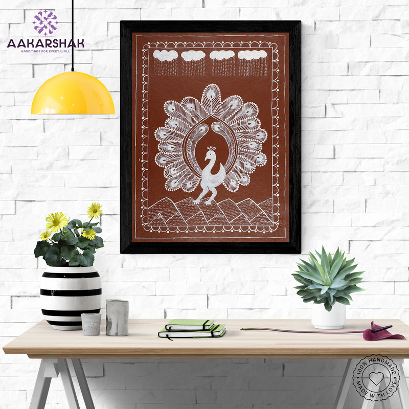 Framed artwork with white peacock design on a brown background-handmade warli painting for home decor