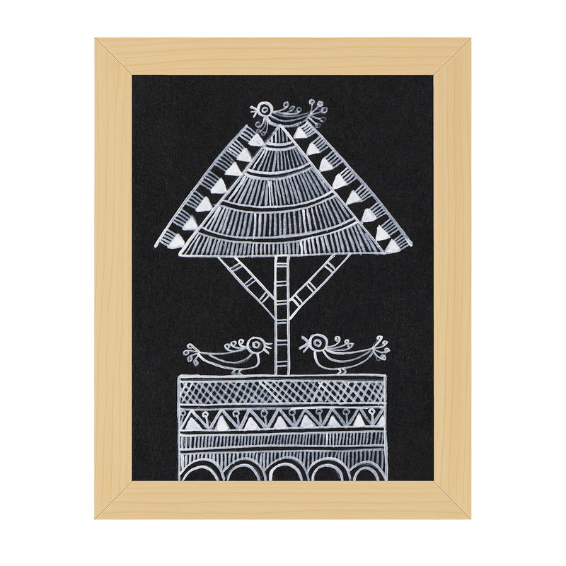 Framed artwork with a black background and white geometric design of a tree and birds.