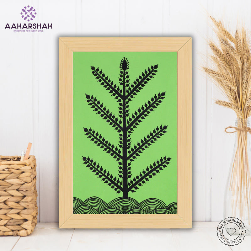 Framed artwork with black tree design on a green background-handmade warli tree painting-with tabletop stand for home decor