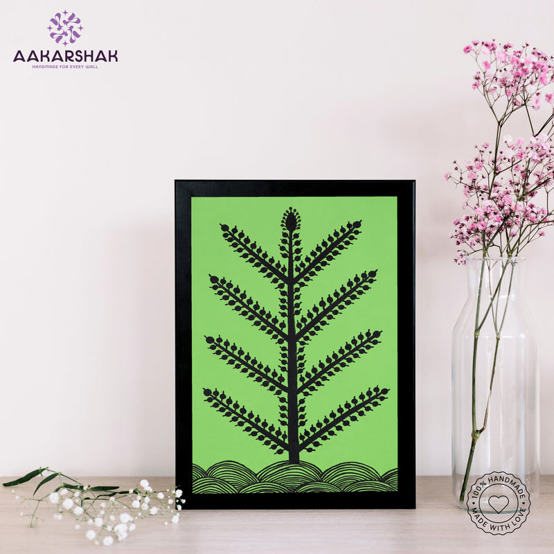 Framed artwork with black tree design on a green background-handmade warli tree painting-with tabletop stand for home decor