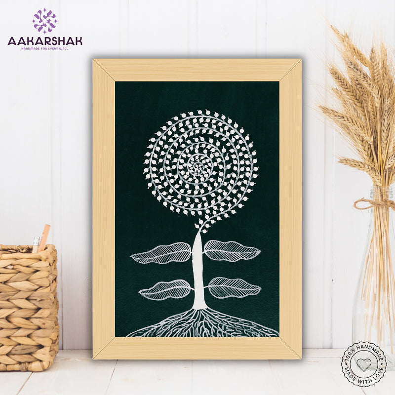 Framed artwork of a white tree design on a dark green background-handmade warli tree painting-with tabletop stand for home decor