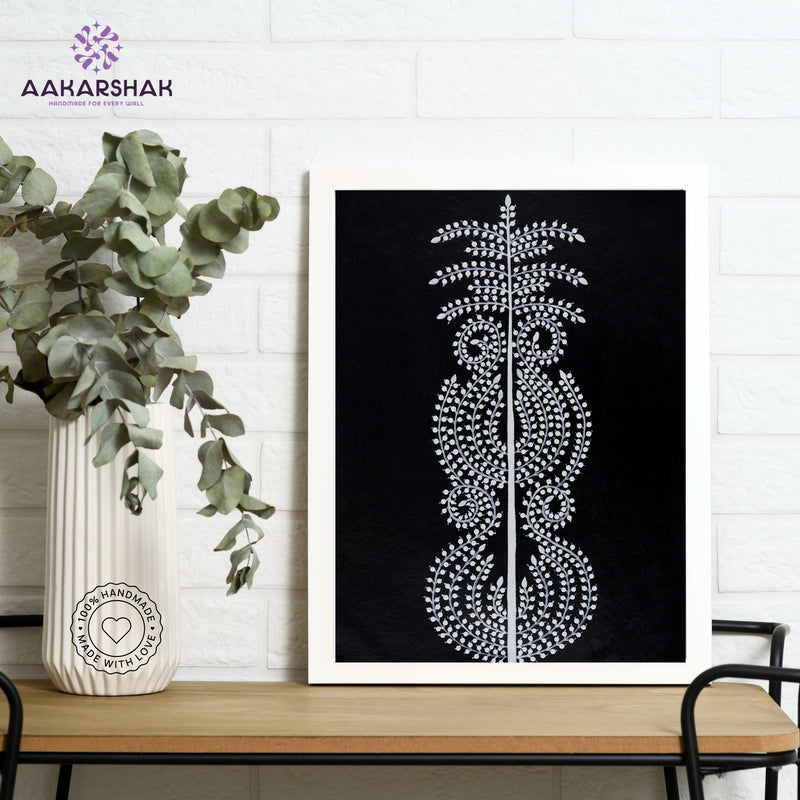 Framed artwork with white tree of life design on a black background-handmade warli painting for home decor
