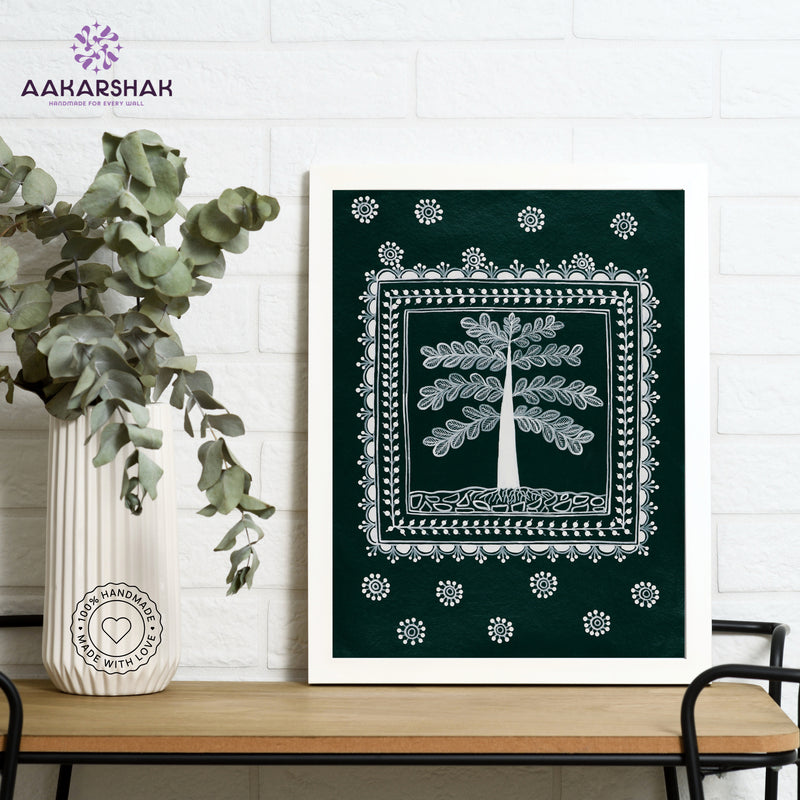 Framed artwork with white tree of life design on a green background-handmade warli painting for home decor
