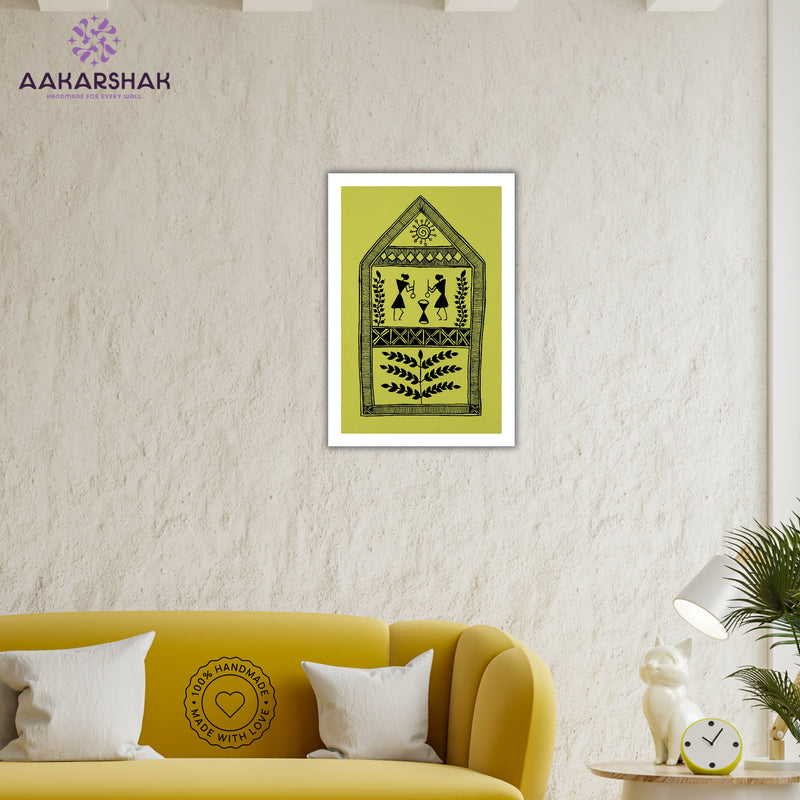Framed artwork with a yellow background and black design-vibrant handmade village painting-depicting indian folk traditions