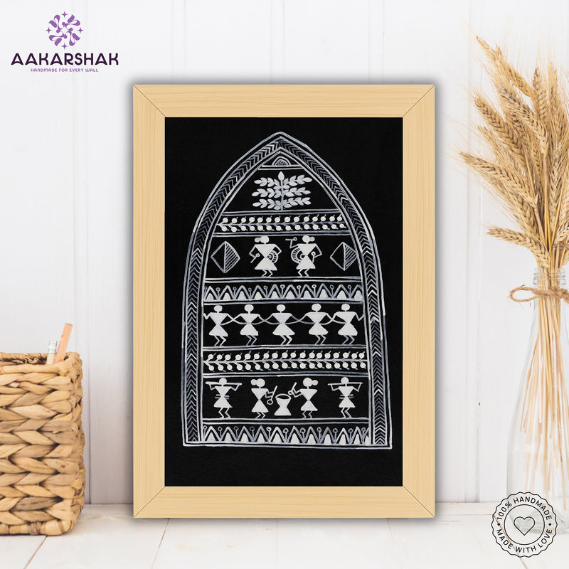 Framed artwork with village warli design on a black background- handmade with tabletop stand for home decor