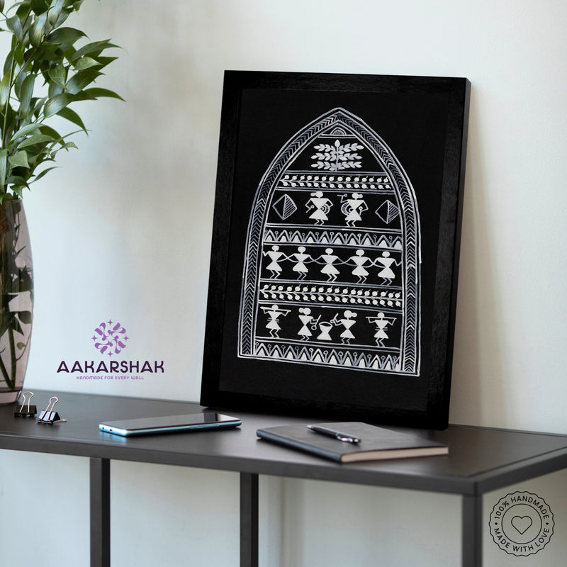Framed artwork with a yellow background and black design-vibrant handmade village painting-depicting indian folk traditions