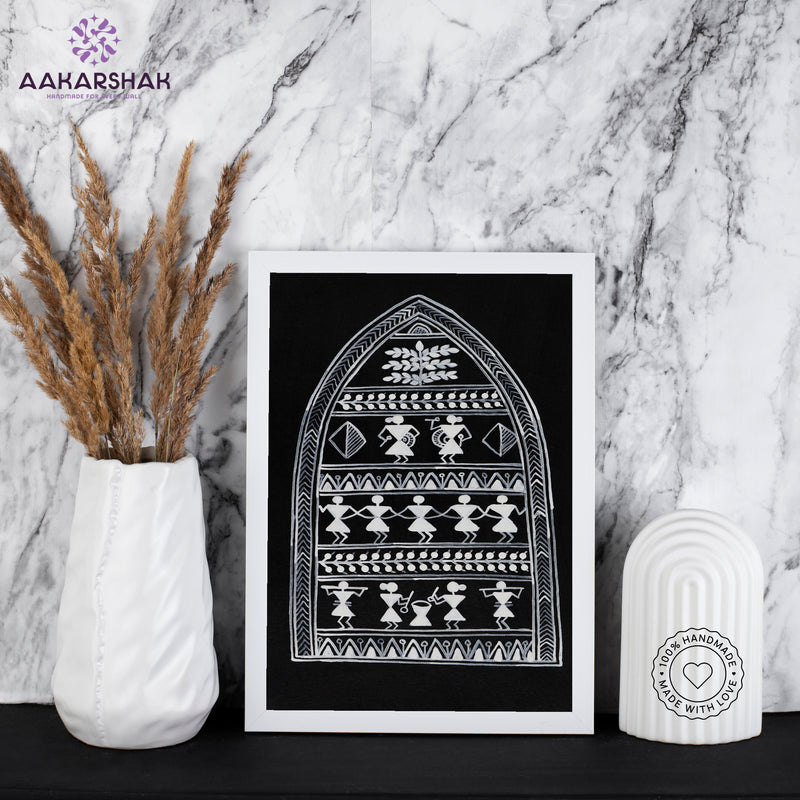 Framed artwork with village warli design on a black background- handmade with tabletop stand for home decor