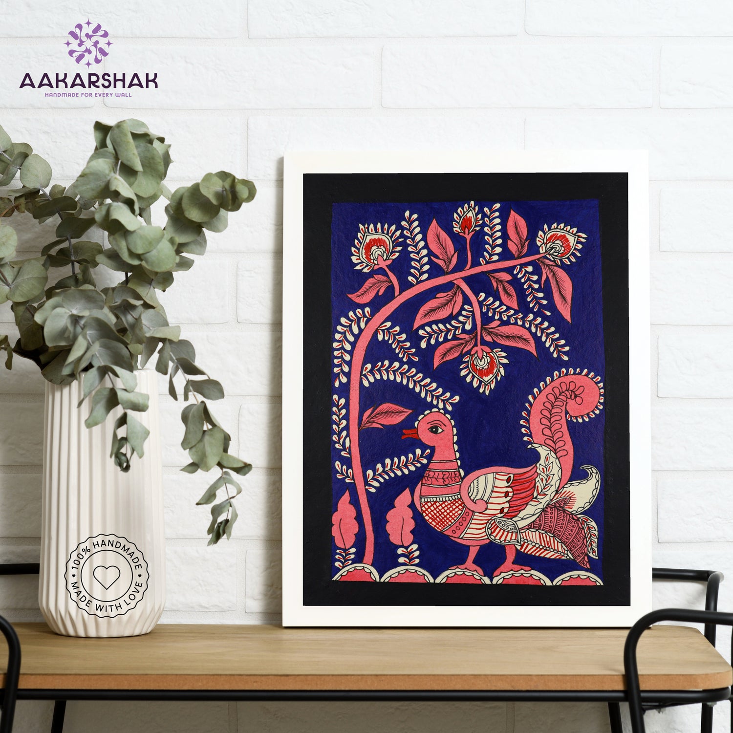 Framed artwork with peacock design on a dark blue background-handmade kalamkari painting for home decor