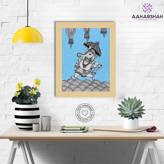 Framed artwork with ganesh design on a blue background-handmade kalamkari painting for home decor