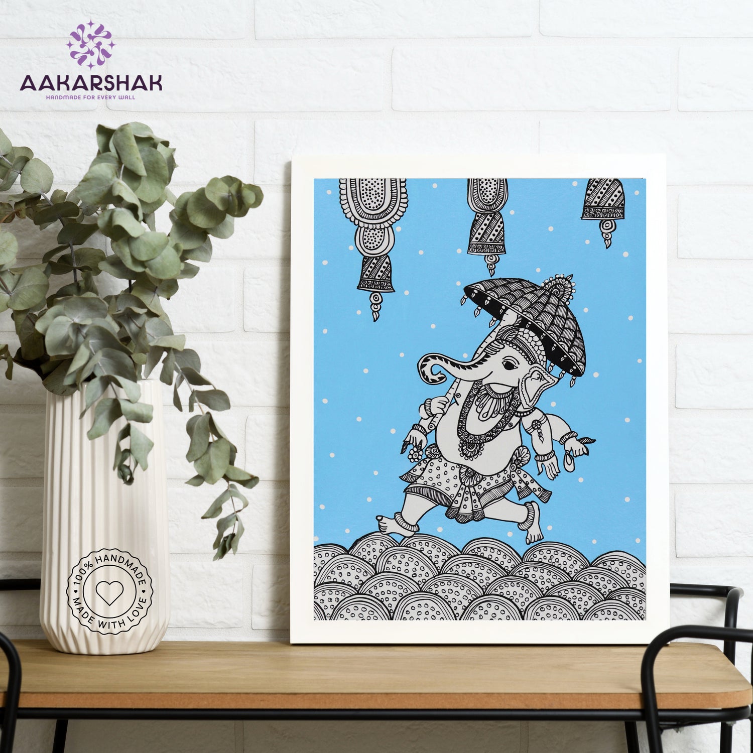 Framed artwork with ganesh design on a blue background-handmade kalamkari painting for home decor