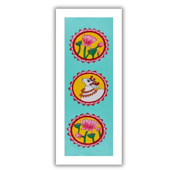 Framed artwork of a colorful lotus and cow-with handmade pichwai painting 