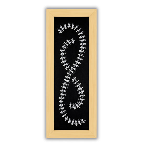 Framed artwork of a colorful dancing-with handmade warli painting 