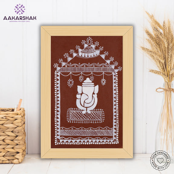 Framed artwork with white ganesh warli painting on a brown background-with tabletop stand for home decor