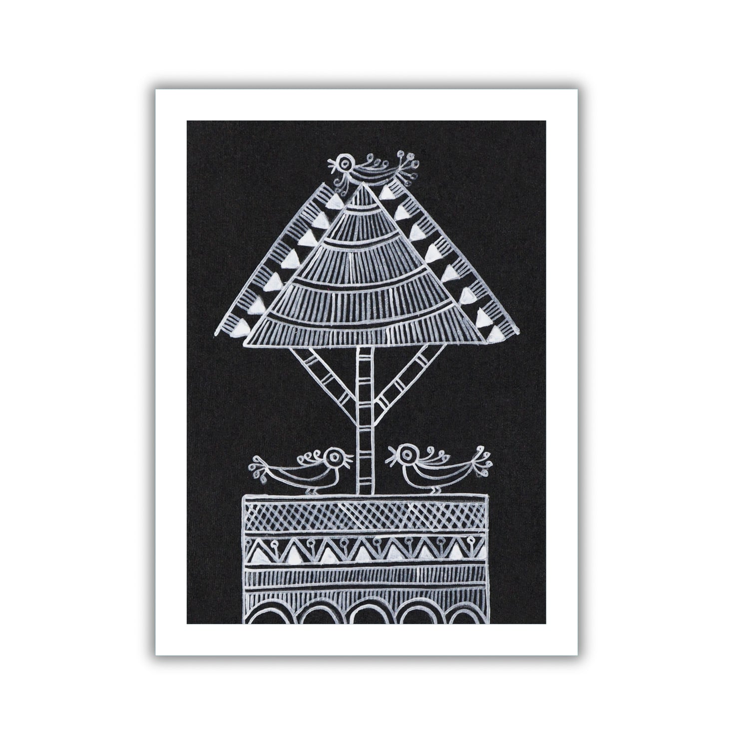 Framed tree artwork with a white geometric design on a black background