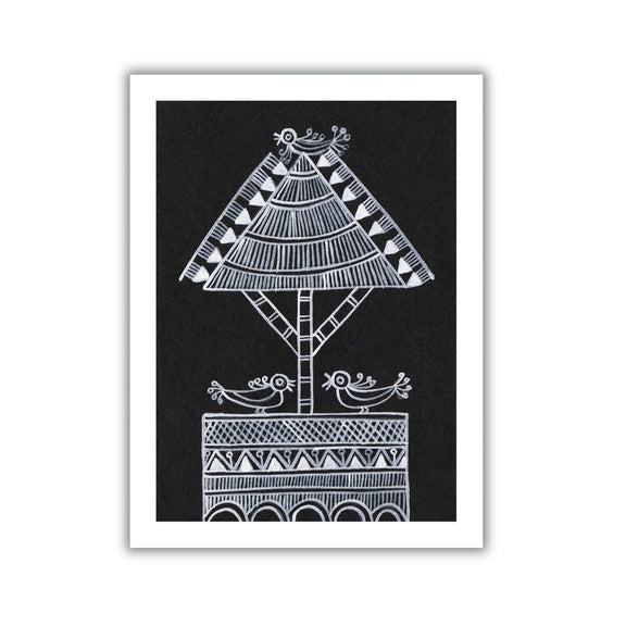 Framed tree artwork with a white geometric design on a black background
