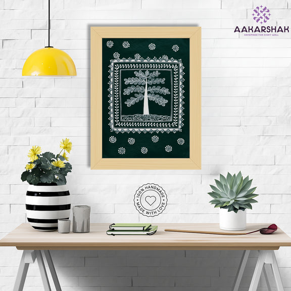 Framed artwork with white tree of life design on a green background-handmade warli painting for home decor
