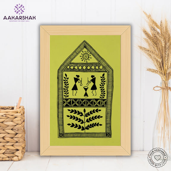 Framed artwork with village warli design on a yellow background- handmade with tabletop stand for home decor