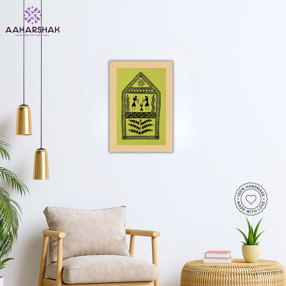 Framed artwork with a yellow background and black design-vibrant handmade village painting-depicting indian folk traditions