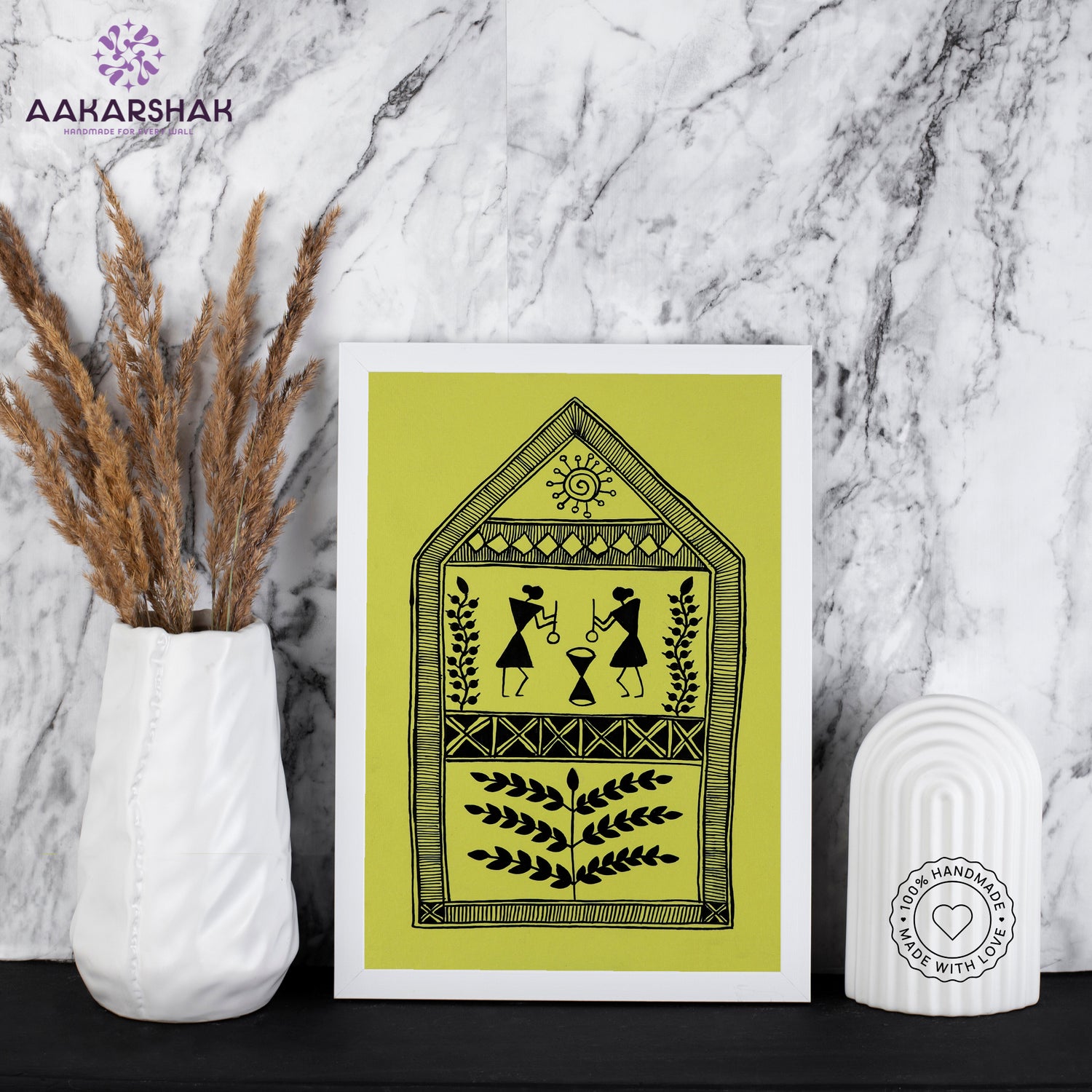 Framed artwork with village warli design on a yellow background- handmade with tabletop stand for home decor