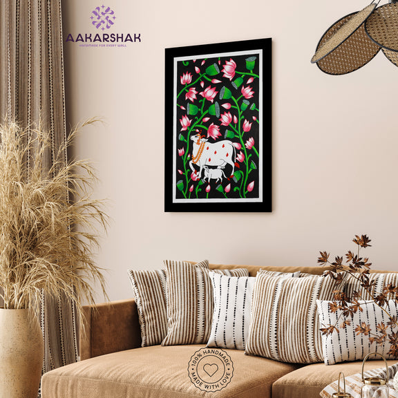 Artisan-made Pichwai painting featuring symmetrical designs and cultural symbolism
